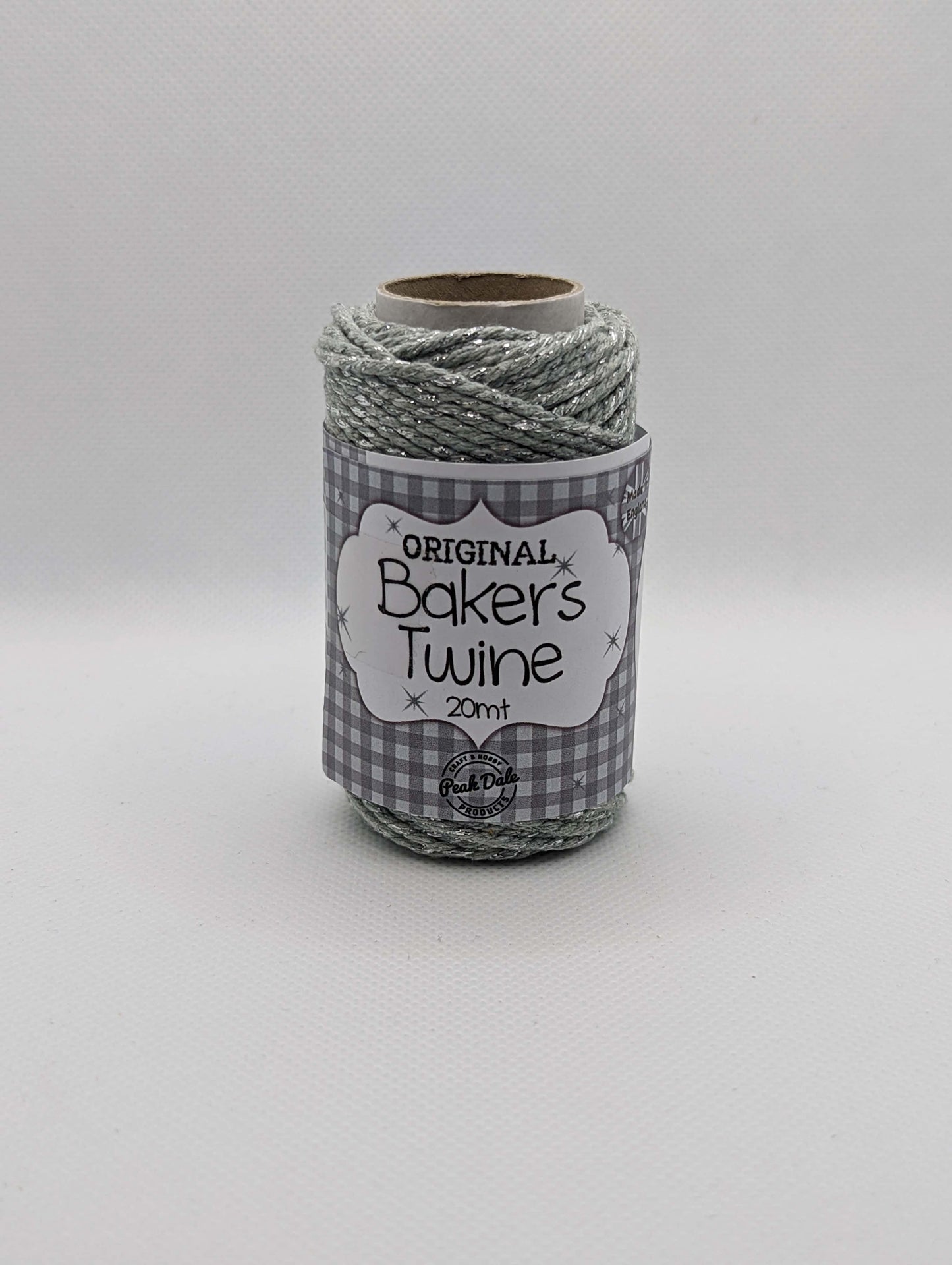 Image of the front of a roll of 20m Bakers Twine. The colour is a grey with silver Shiny parts running through it. Great for wrapping packages and presents/ gifts.