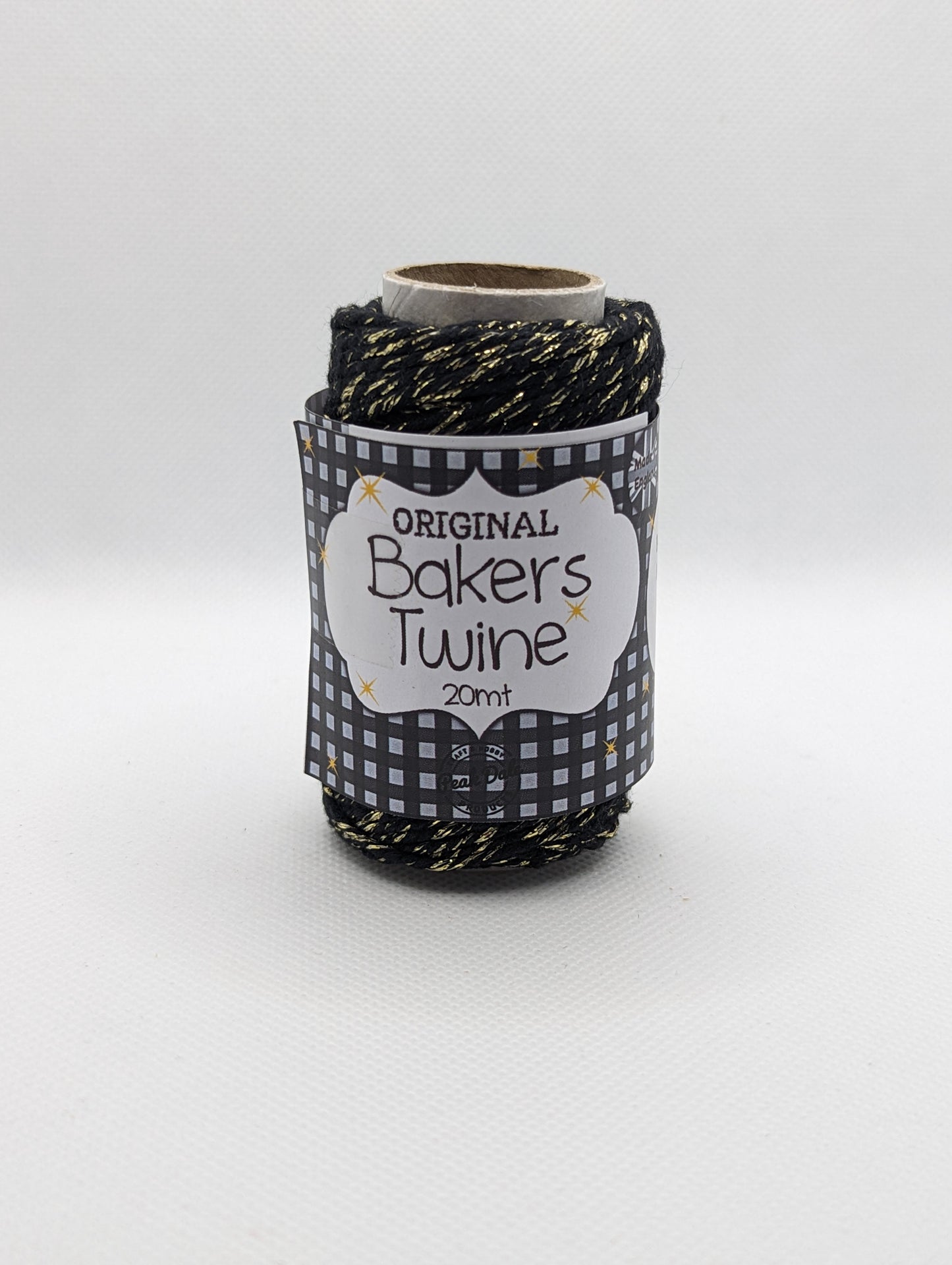 Image of the front of a roll of 20m Bakers Twine. The colour is a black with gold Shiny parts running through it. Great for wrapping packages and presents/ gifts.