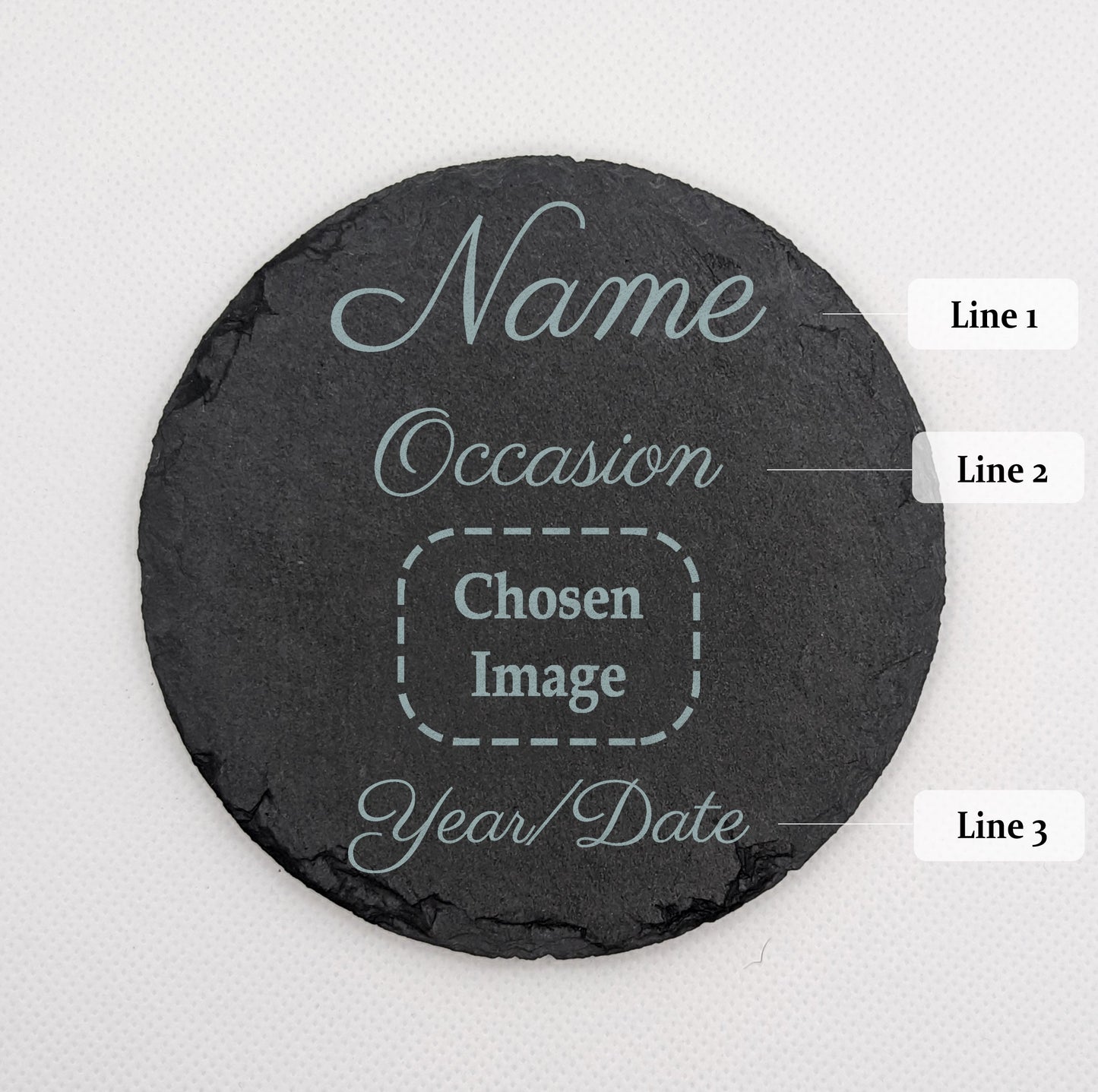 Shows a Babys first themed circle slate coaster 10cm by 10cm. It is engraved with example text saying Name Line 1, Occasion Line 2, Year or Date Line 3. And a space with Chosen Image for the customised image. It is against a white background
