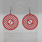 Shows a pair of Circle earrings that have black ear wire fixings. They are Geometric Chevron designs with a yin and yang in the centre. They are made from Red Acrylic. They are against a white background on see through stands.