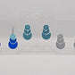 An image of three pairs of Snowman earrings with ear wire hook fixings. They are in three parts that dangle. The are made from acrylic and are Silver glitter, ice blue glitter and Spearmint, blue and Translucent Blue in colour.